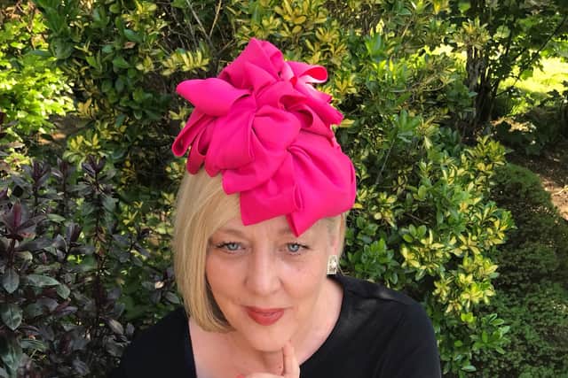 Sherry Richardson wears her own Hats by Sherry pink petal headpiece. Prices for bespoke pieces start at £100 and go up to £550, depending on the work needed.