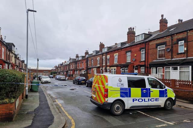 The police scene, in place on Brown Hill Terrace, between Sunderland Road and Harehills Lane, in Leeds after a woman's body was found.