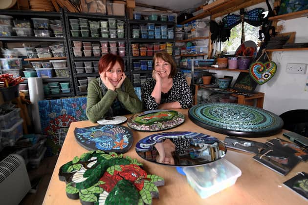 BAMM North mosaic artists Frances Taylor (left) and Flick Gillett with their work, at the Mosaic Mania studio in Otley. They are exhibiting their mosaics for home and garden at RHS Harlow Carr. Picture by Yorkshire Post photographer Simon Hulme.