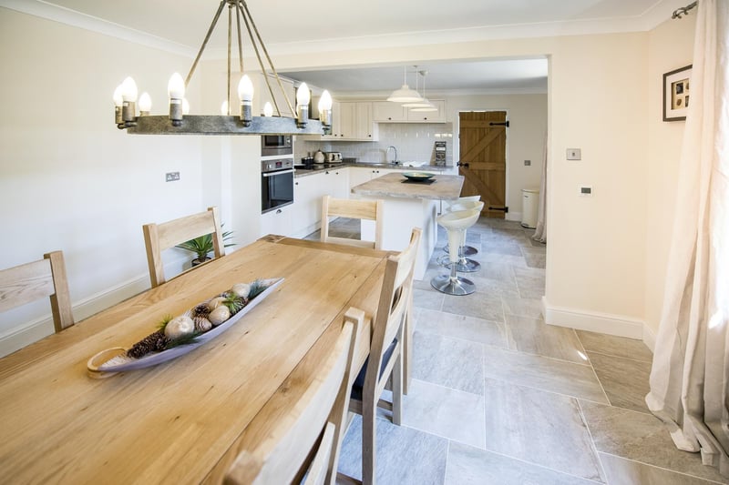 The open plan kitchen/dining area has been perfectly planned