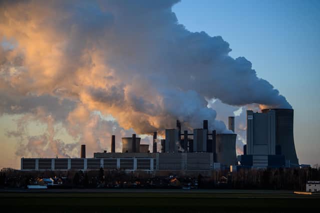 Steam rises from cooling towers at a coal-fired power plant. PIC: Lukas Schulze/Getty Images