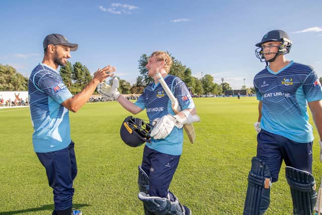 Well played, lads. Shan Masood, the Yorkshire captain, congratulates Harry Duke, centre, and Dom Leech, right, after their match-winning last-wicket stand against Surrey at York. Picture by Allan McKenzie/SWpix.com