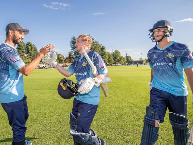 Well played, lads. Shan Masood, the Yorkshire captain, congratulates Harry Duke, centre, and Dom Leech, right, after their match-winning last-wicket stand against Surrey at York. Picture by Allan McKenzie/SWpix.com