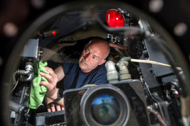 Darren Heradleand cleaning his Canberra PR7 cockpit, one of 7 at the South Yorkshire Air Museum.