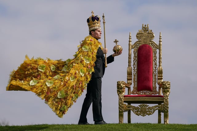 HARROGATE, ENGLAND - APRIL 19: Rupert North wears the floral coronation cloak, designed by award-winning, Harrogate based florist Helen James during a photo call on staging day of the Spring Flower Show. (Photo by Ian Forsyth/Getty Images)