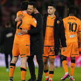 Hull City manager Liam Rosenior (centre left) embraces Hull City's Lewis Coyle following the Sky Bet Championship victory at Southampton (Picture: Adam Davy/PA Wire)