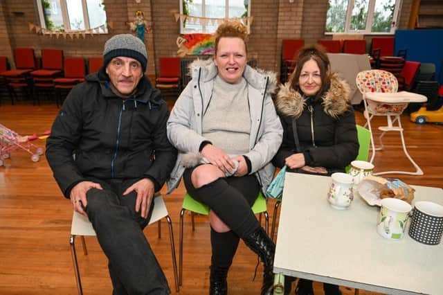 Tony Dearing, Louisa Novis and Tonita Bennett (from left to right) at The Hot Pot warm space in Hull's St Philip's Church (Image: Duncan Young)