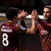 BRADFORD, ENGLAND - OCTOBER 14: Calum Kavanagh of Bradford City celebrates with teammate Stephen Humphrys after scoring his team's first goal during the Vertu Trophy match between Bradford City and Everton U21 at University of Bradford Stadium on October 14, 2025 in Bradford, England. (Photo by George Wood/Getty Images)
