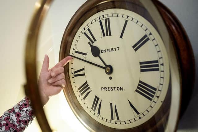 Antique clock specialists carries out the British Summer Time adjustment of the clocks. (Pic credit: Leon Neal / Getty Images)
