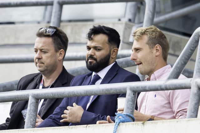 Azeem Rafiq, centre, at the Headingley Test match between England and New Zealand in June. On the left is George Dobell, the journalist who has championed his story from the start. Picture by Allan McKenzie/SWpix.com
