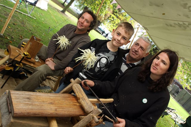 Ben Hill and Jo Rowland from Campwood crafts are pictured with Josh Cousins aged 7 and his Grandad Peter Cousins at Chesterfield's Green Fair 2011