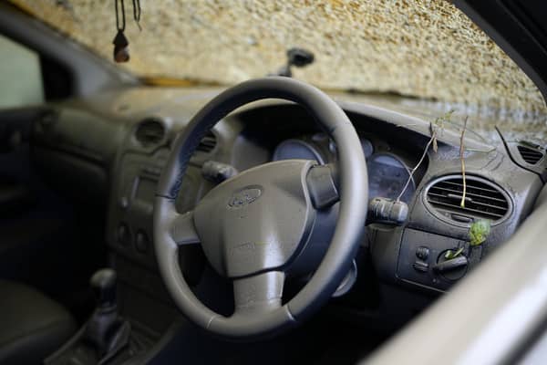 The interior of a Ford is seen as flood waters recede in the village of Catcliffe after Storm Babet. PIC: Christopher Furlong/Getty Images