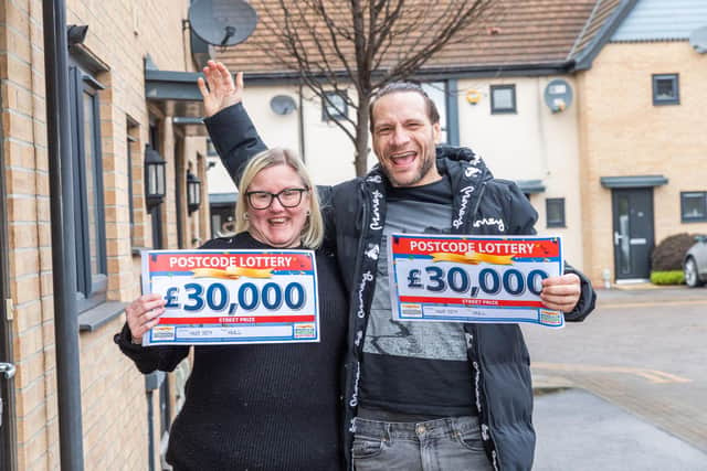 Adam Scaife and his next-door neighbour Donna Hall both won £35,000 of prizes