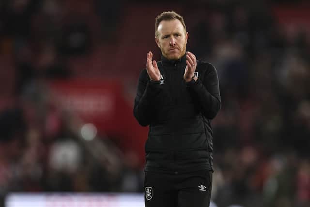 Huddersfield Town caretaker manager Jon Worthington applauds the fans at full time following the 5-3 defeat at Southampton (Picture: Steven Paston/PA Wire)