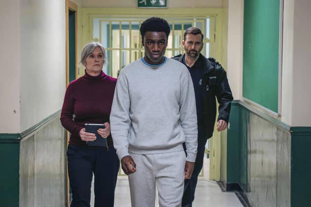Siobhan Finneran as Marie Louise O’Dell, Chukwubuiken Molokwu as Christopher (Ushindi) Madubuko and David Tennant as custodial officer Bobby Bailey in Time. Picture: BBC/BBC Studios/Peter Marley