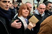 Gisele Pelicot leaves the courthouse after hearing the verdict of the court that sentenced her ex-husband to the maximum term of 20 years jail for committing and orchestrating her mass rapes with dozens of strangers he recruited online, in Avignon on December 19, 2024. (Photo by Miguel MEDINA / AFP) (Photo by MIGUEL MEDINA/AFP via Getty Images)
