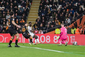 Middlesbrough's Emmanuel Latte Lath squeezes the pall past Hull City keeper Ryan Allsop to Boro ahead in a see-saw Championship contest with Hull City. Picture: Tony Johnson.