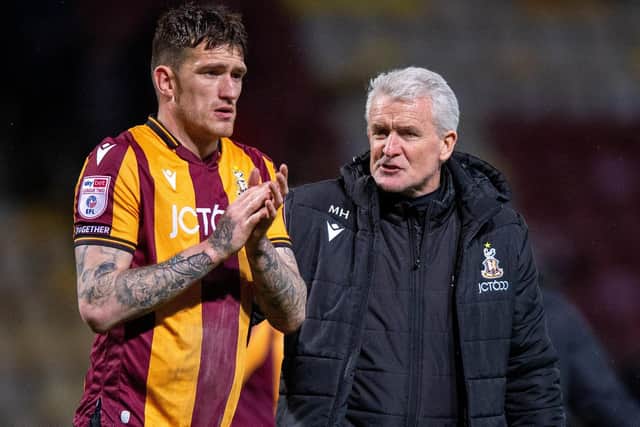 Mark Hughes and Andy Cook have moved Bradford City up to fifth (Picture: Bruce Rollinson)
