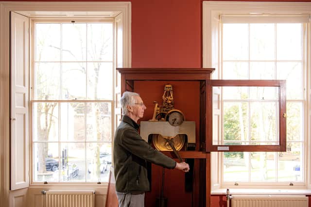York Clock Group member John Cossins winding the De Grey House clock,  photographed for The Yorkshire Post Magazine by Tony Johnson.