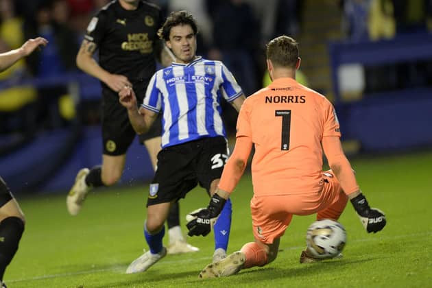 GOING UP: Reece James, pictured scoring for Sheffield Wednesday in the League One play-off semi-finals, has won three promotions