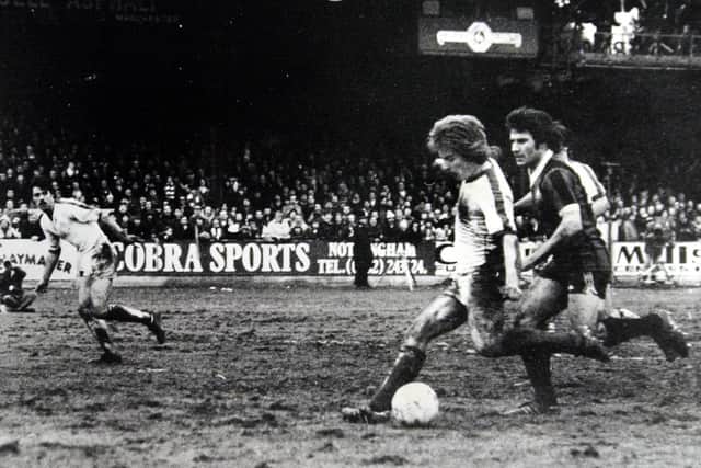 LEGEND: Paul Hendrie scores Halifax's winning goal against Manchester CIty in January 1980.