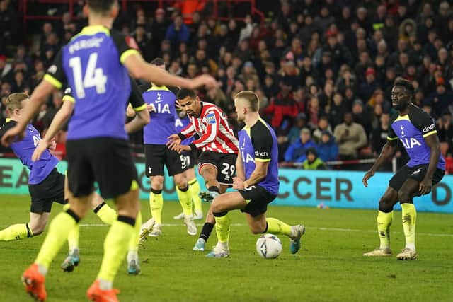 Sheffield United's Iliman Ndiaye (centre) scores their side's first goal of the game during the Emirates FA Cup fifth round match at Bramall Lane, Sheffield. Picture date: Wednesday March 1, 2023. PA Photo. See PA story SOCCER Sheff Utd. Photo credit should read: Mike Egerton/PA Wire.

RESTRICTIONS: EDITORIAL USE ONLY No use with unauthorised audio, video, data, fixture lists, club/league logos or "live" services. Online in-match use limited to 120 images, no video emulation. No use in betting, games or single club/league/player publications.
