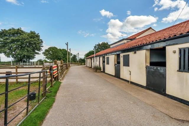 The property comes with ten stables and a host of equestrian facilities