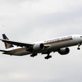 File photo dated 03/06/09 of a Singapore Airlines Boeing 777 landing at Heathrow Airport. Steve Parsons/PA Wire