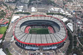 This aerial view shows the Mexico City Stadium, renamed from Azteca Stadium (or Banorte Stadium) for the FIFA World Cup, in Mexico City on May 28, 2026. FIFA temporarily branded the iconic Azteca Stadium as "Mexico City Stadium" for the 2026 World Cup, enforcing a strict "debranding" policy that requires all host stadiums to remove or cover non-official corporate sponsor names, suite branding, and external logos. (Photo by Carl DE SOUZA / AFP via Getty Images)