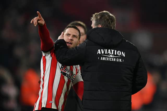 Tensions: Billy Sharp of Sheffield United is spoken to by Phil Parkinson, manager of Wrexham, after taunting fans of Wrexham. (Picture: Michael Regan/Getty Images)