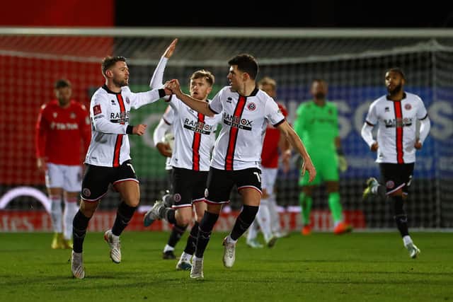 WREXHAM, WALES - JANUARY 29: Oliver Norwood of Sheffield United celebrates after scoring the team's second goal during the Emirates FA Cup Fourth Round match between Wrexham and Sheffield United at Racecourse Ground on January 29, 2023 in Wrexham, Wales. (Photo by Michael Steele/Getty Images)