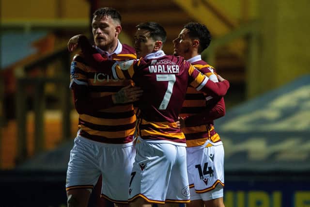 Marksmen: Tyler Smith, right, celebrates his opening goal for Bradford City against Liverpool U21 in the EFL Trophy on Tuesday night with Jamie Walker and Andy Cook. (Picture: Bruce Rollinson)
