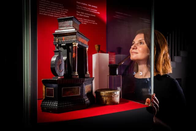 Lauren Mableson, Marketing Manager, for The Bar Convent, York, looking at the Portable recusant altar, 16th century, one of the artifacts in the exhibition.
Picture By Yorkshire Post Photographer,  James Hardisty.