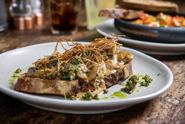 Shrooms on toast -
A seasonal mixture of chestnut, button and flat cap mushrooms cooked in butter, finished with a rich, roast onion cream. Served on toasted malt sourdough with chestnut gremolata, fried enoki mushroom and chive oil.
PIcture by Tony Johnson