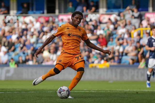 ON TARGET: Hull City's Jaden Philogene-Bidace scores their first goal during the Sky Bet Championship match at The Den. Picture: Ben Whitley/PA