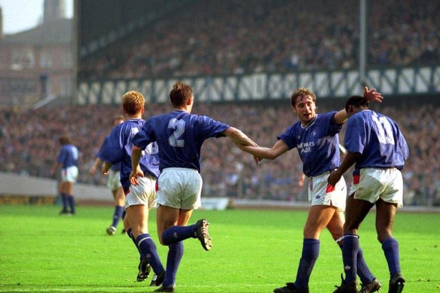 Rangers celebrate during a Rangers v St Mirren football match at Ibrox in October 1990.