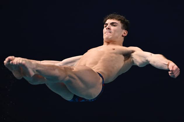 Bouncing back: City of Sheffield's Ross Haslam diving towards 1m springboard bronze medal at the world championships in Doha (Picture: SEBASTIEN BOZON/AFP via Getty Images)