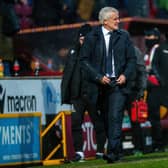 SETBACK: Mark Hughes heads for the dressing room during Bradford City's defeat to Northampton Town