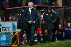 SETBACK: Mark Hughes heads for the dressing room during Bradford City's defeat to Northampton Town
