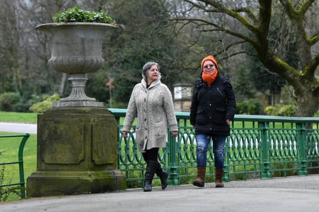 Olena Bezlepkina, right, walks in People's Park with Mandy Cioch. Picture: Jonathan Gawthorpe.