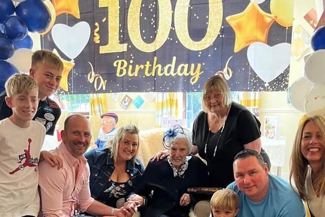 Joyce with her family at the party. (Pic credit: Aden View Care Home)
