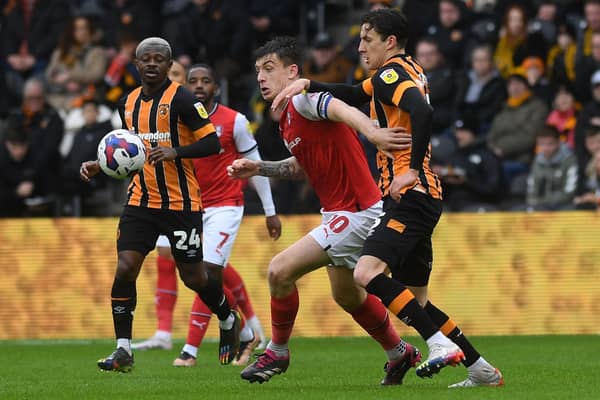BATTLING CLEAN SHEET: But Hull City's Alifie Jones, right, competing for the ball with Rotherham United's Jordan Hugill, came away frustrated