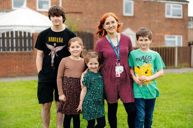 Abi Powdrell, pictured with her children. Photo: University of Hull.