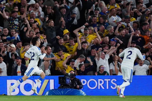 PINBALL WIZARD: Ao Tanaka (left) runs away after opening the scoring (Image: Annabel Lee-Ellis)