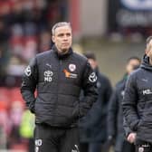 Barnsley interim head coach Martin Devaney (right), who takes charge of the crunch final-day game with Northampton Town. Picture: Tony Johnson