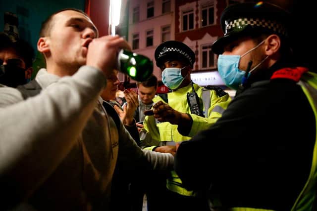 Police officers could attend areas around clubs and bars undercover, along with increased patrols as people leave at closing time under the new proposals (Photo: HOLLIE ADAMS/AFP via Getty Images)
