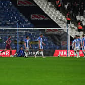 DEJECTION: Huddersfield Town got 2-0 down in the 11th minute