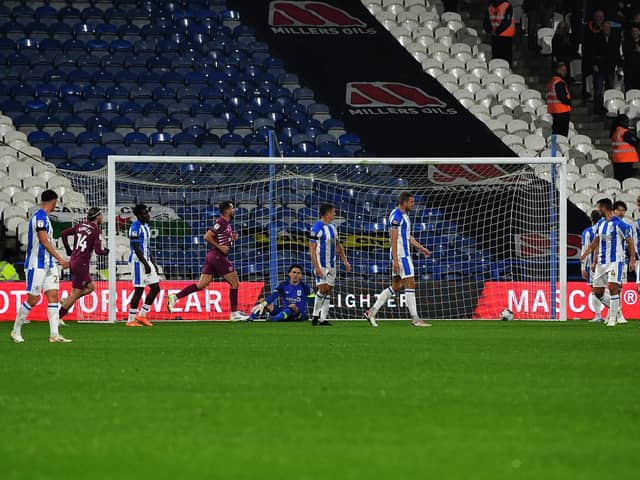 DEJECTION: Huddersfield Town got 2-0 down in the 11th minute