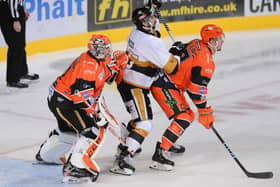 SOLID: Sheffield Steelers' defenceman Davey Phillips (right) protects the net in front of goalie Matt Greenfield. Picture courtesy of Dean Woolley/Steelers Media/EIHL