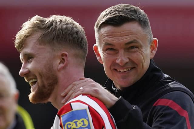 Tommy Doyle of Sheffield Utd and Paul Heckingbottom manager of Sheffield Utd celebrate after the The FA Cup quarter-final at Bramall Lane (Picture: Andrew Yates / Sportimage)